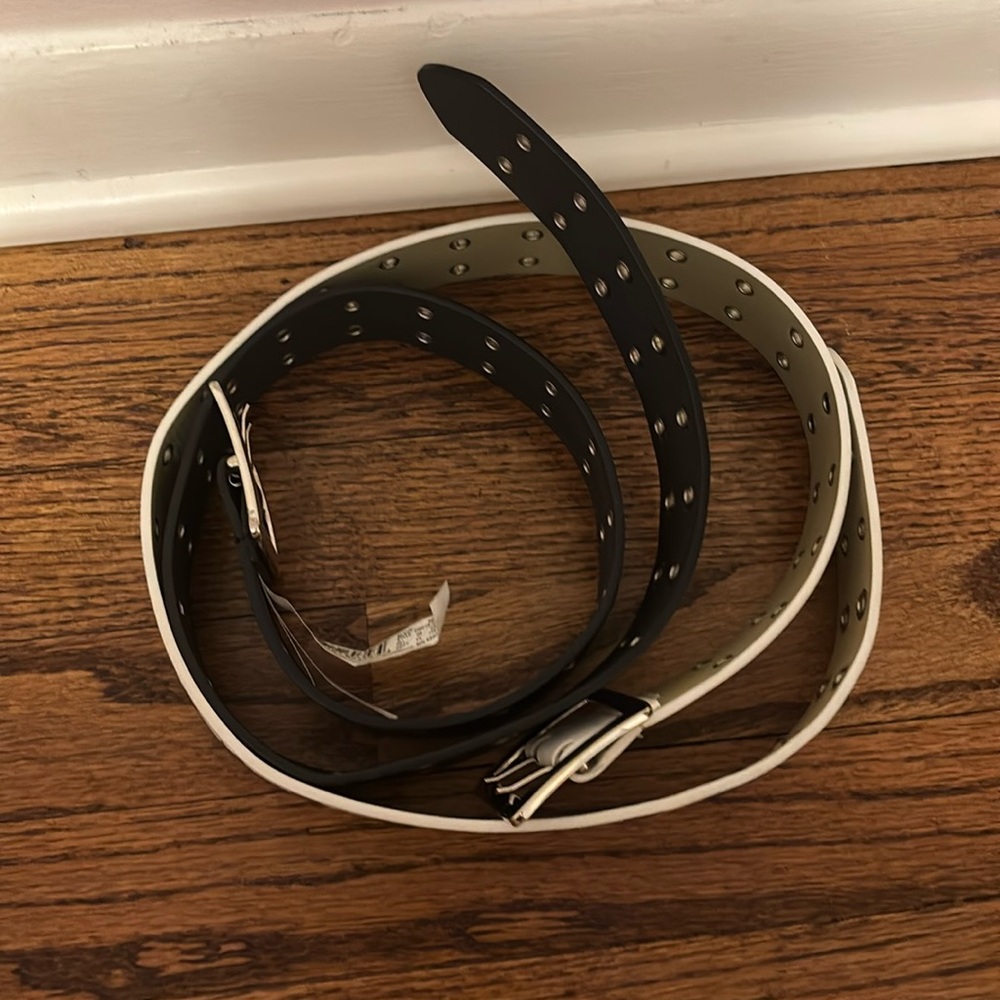 target belts, one black and one white